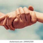couple-helping-praying-hand-on-260nw-2490452509